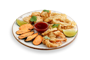Fried seafood dish with crispy shrimp, squid and mussels served with sauce on an isolated white background