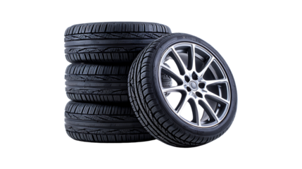 Stack of four car tires and one alloy wheel isolated on transparent background