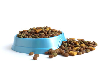 There is a bowl of dry pet food on a white background.