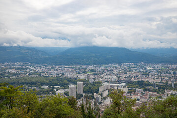 Aerial view of Grenoble seen from Bastille Fort, Auvergne-Rhone-Alpes region, France, Europe. View from above on the Isere Valley in the French Pre-Alps. Chartreuse Belledonne mountain range