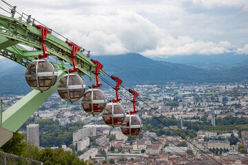 GRENOBLE, FRANCE - SEPTEMBER 26, 2025: A touristic cable car in Grenoble, with an amazing view of the city from Bastille fortress