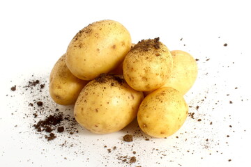 There are a lot of raw potatoes on a white background.