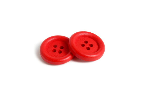 	
There is one red button on a white background.	
