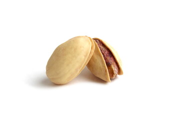 There are two pistachios on a white background.