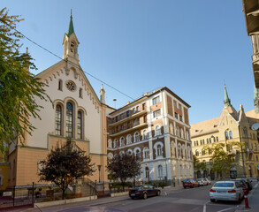 Buildings along Hold street towards two churches, Budapest, Hungary.