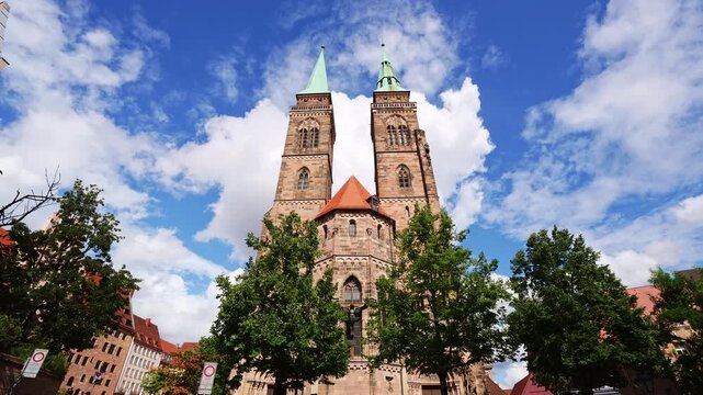 Saint Sebald Church on Sunny Day. Green Trees. Nuremberg, Franconia, Germany