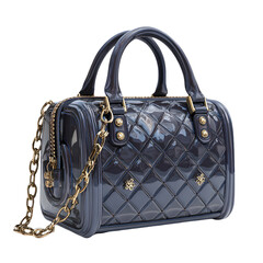 Stylish quilted dark blue handbag with gold chain details isolated on transparent background