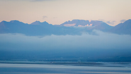 On a peaceful, Eyjafjörður Fjord sailing into Akureyri, misty start to a beautiful day, August 2025 