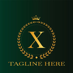 Elegant golden letter x logo with crown and laurel wreath on dark green background