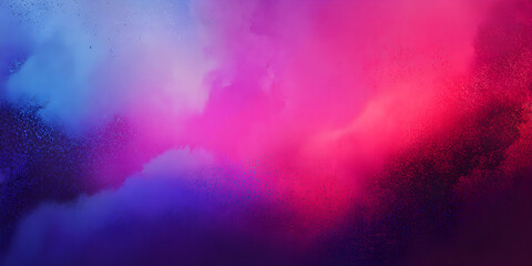 Vibrant abstract explosion of colored powder in blue, pink, and red hues, creating a dynamic and energetic cloud formation with a dark background