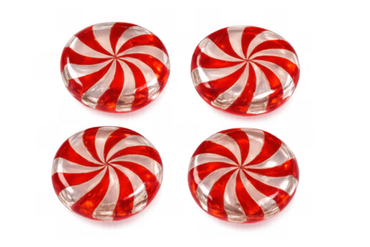 Four round hard candies showcasing classic red and white spiral patterns, offering a sweet holiday and winter flavor