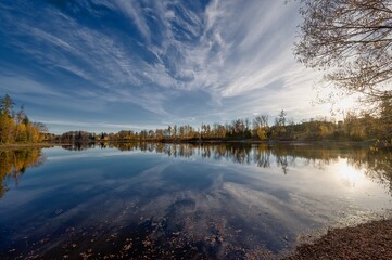 View of Hejlovsk&yacute; Pond, November afternoon, slightly cloudy sky, lower water level before fishing