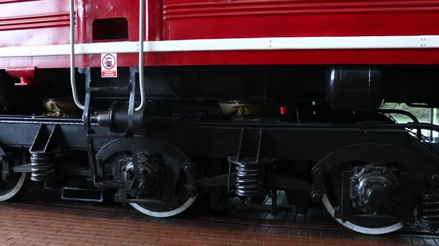 A detailed view of a train wheel's surface and pattern