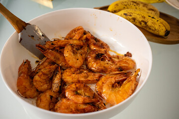 Fried shrimps and langoustines on a plate. Close-up of fried shrimps and langoustines.