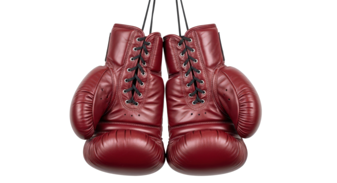 Classic red boxing gloves hanging on display, sport equipment isolated on transparent background