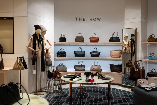Luxury handbags on display at Lane Crawford department store
