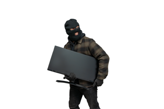 Thief wearing balaclava stealing computer monitor, looking away suspiciously, carrying stolen electronic device on a transparent background