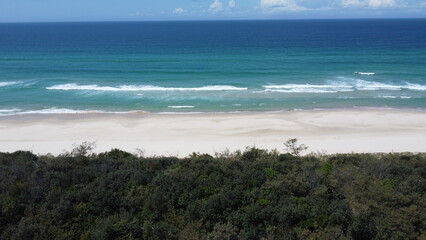 Aerial view of pristine turquoise beach