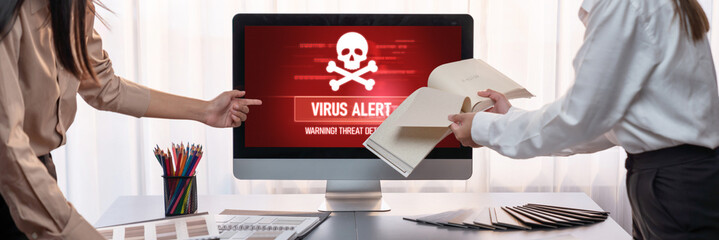 Virus warning alert on computer screen detected brisk cyber threat , hacker, computer virus and malware