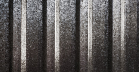 Ribbed steel panel with vertical lines and repetition. Clean industrial background for roofing, siding and construction use.