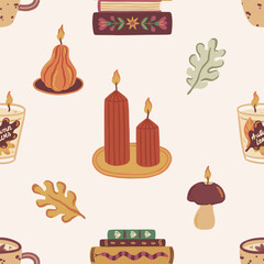 Cozy seamless vector pattern with burning autumn candles, decorated books, and fall leaves. Hand drawn fall decor in warm colors. Hygge style background for textile, wrapping paper, notebook cover