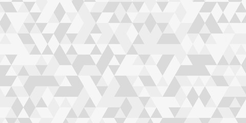 Fototapeta premium White triangular mosaic backdrop. Polygonal mosaic abstract banner background. Seamless modern pattern. 