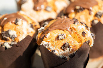 Fresh Chocolate Chip Muffins with Melted Chocolate – Close-Up of Delicious Homemade Dessert