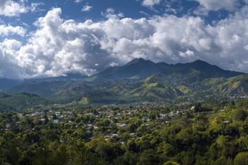 Fototapeta premium Breathtaking Jarabacoa Landscape: Majestic Mountains Under a Cloudy Sky in a Summer Panorama