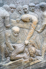 Station IX: Jesus falls for the third time. The Way of the Cross on Mount Križevac (the Cross Mountain) in Medjugorje.