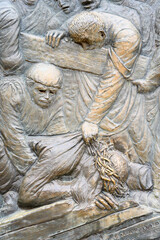 Station IX: Jesus falls for the third time. The Way of the Cross on Mount Križevac (the Cross Mountain) in Medjugorje.