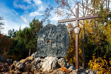 Station III: Jesus falls for the first time. The Way of the Cross on Mount Križevac (the Cross Mountain) in Medjugorje.