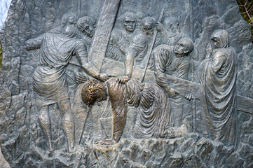 Station III: Jesus falls for the first time. The Way of the Cross on Mount Križevac (the Cross Mountain) in Medjugorje.