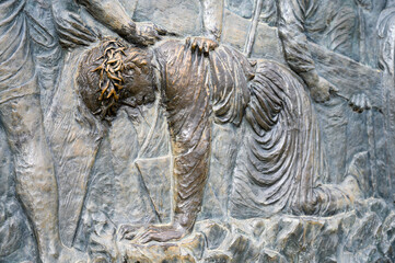 Station III: Jesus falls for the first time. The Way of the Cross on Mount Križevac (the Cross Mountain) in Medjugorje.