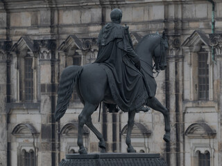 Fototapeta premium Equestrian statue in front of the historic baroque façade of the Dresden Cathedral, Saxony, Germany