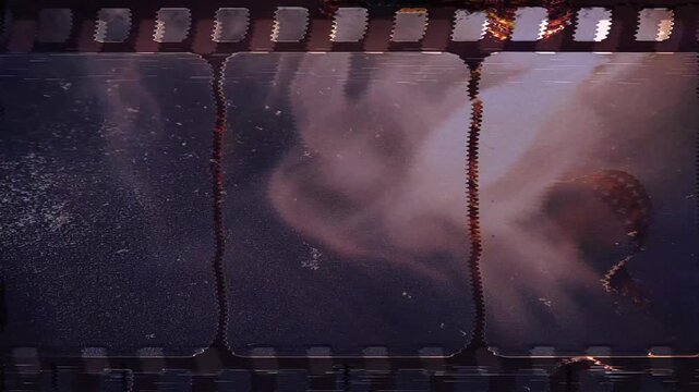 Close up of old vintage slide films glitch effect