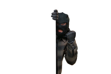 Balaclava-clad man showing clenched fist, representing crime, danger, and hidden threats peeking from empty space