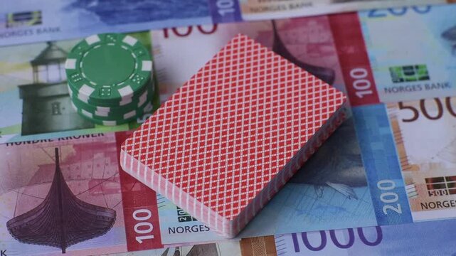 Casino game in the Norway, Norwegian krone money, chips, cards. Gambling in casinos in the Norway