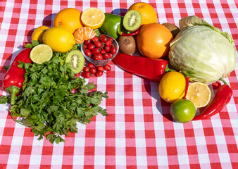 Colorful mix of vitamin C rich foods – citrus, kiwi, peppers, parsley – promoting health, wellness, and strong immunity. Natural sources of vitamin C representing balanced diet.