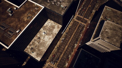 Tall buildings create a dramatic backdrop as traffic flows along the busy road below. The setting showcases a vibrant urban landscape with a mix of modern architecture and city life.