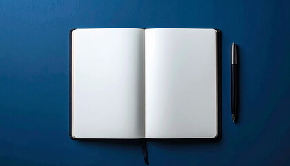 Top view of blank notebook with pen on dark blue background, minimal composition, mock-up