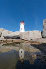Peggys Cove, Canada - October 06, 2025: Peggys Point Lighthouse, also known as Peggys Cove Lighthouse, is an active lighthouse and an iconic Canadian image.