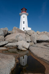 Peggys Cove, Canada - October 06, 2025: Peggys Point Lighthouse, also known as Peggys Cove Lighthouse, is an active lighthouse and an iconic Canadian image.