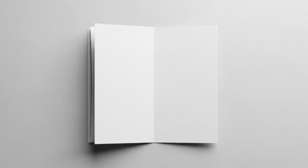 Open blank book with white pages on a clean minimal background