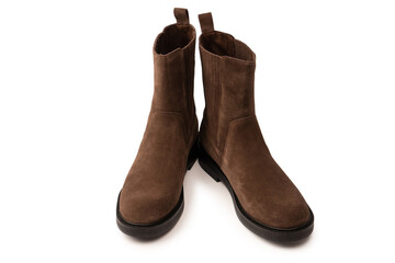 Brown leather boots isolated on white background.