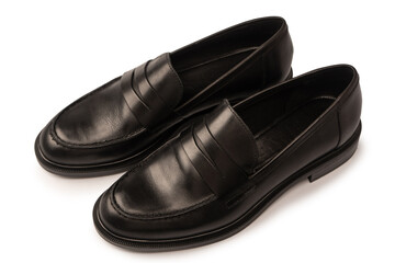 Black leather loafers isolated on white background.