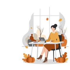 Woman working on tablet in a cozy autumn office Seasonal business comfort and remote productivity