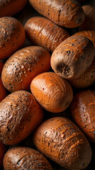 yams whole and sliced, vibrant and ready for cooking