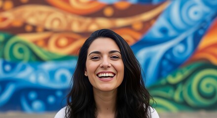 Happy Woman Laughing with Colorful Mural Background