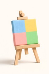 Miniature easel displaying a colorful abstract canvas divided into four squares