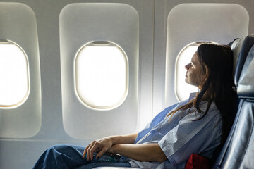 Armenia. Yerevan. Business class passenger in the plane cabin.